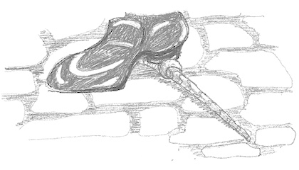 Drawing of a shiny black boot stepping on the handle of a wand on a stone floor.